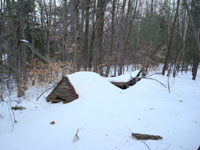 Remains of the original base area hut (2008)